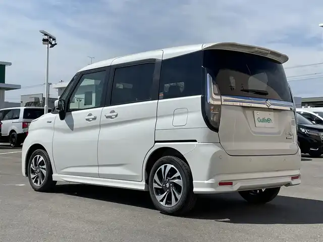 スズキ ソリオ バンディット HV MV 東京都 2025(令7)年 0.4万km ピュアホワイトP ワンオーナー　/ヘッドアップディスプレィ　/ブラインドスポットモニター　/純正ＬＥＤヘッドライト　/セーフティサポート /（予防安全技術）/・デュアルセンサーブレーキサポート２/・後方誤発進抑制機能/・誤発進抑制機能/・低速時ブレーキサポート/・パーキングセンサー/・全車速追従機能停止保持機能付クルーズコントロール　/・発進お知らせ機能/・ハイビームアシスト/・車線逸脱警報/両側パワースライドドア/プッシュエンジンスタート/パーソナルテーブル/・ロールサンシェード/保証書＆取説