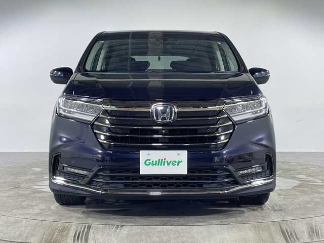 ホンダ オデッセイ アブソルート EX 福岡県 2021(令3)年 2万km プレミアムヴィーナスブラックP 純正10インチナビ/　フルセグ CD DVD USB HDMI/　Apple Car Play /全方位カメラ　アランドビューモニター/ブラインドスポットモニター/両側パワースライドドア/ハンズフリーアクセス パワーテールゲート/ビルトインETC2.0/ドライブレコーダー/クルーズコントロール追従有/ホンダスマートパーキングアシスト/２列目プレミアムクレイドルシート/２列目オットマン/2列目LEDアンビエントランプ/パドルシフト/AC100Vコンセント/ハーフレザーシート/・D/N席パワーシート/・D/N席シートヒーター/LEDヘッドライト/フォグランプ/スマートキー/プッシュエンジンスタート/純正フロアマット/純正アルミホイール/ドアバイザー