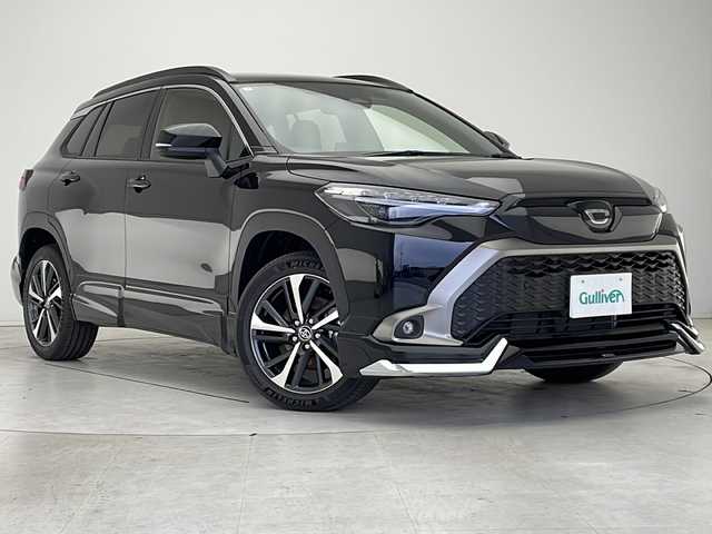 トヨタ カローラ クロス ハイブリッド Z 愛知県 2025(令7)年 0.1万km未満 アティチュードブラックマイカ 登録済未使用車/衝突軽減システム/ガラスルーフ/モデリスタエアロ/レーダークルーズコントロール/シートヒーター/フルセグ/Bluetooth/バックカメラ/コーナーセンサー/純正アルミホイール/ルーフレール/ETC2.0/LEDヘッドライト/オートマチックハイビーム/ステアリングスイッチ/スマートキー/プッシュスタート