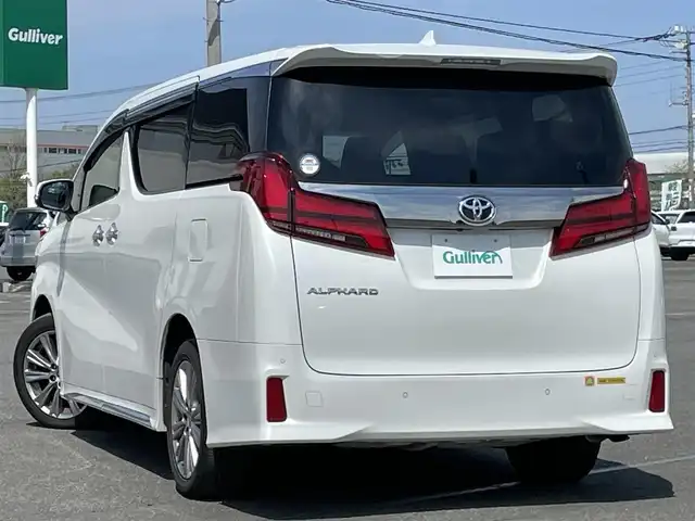 トヨタ アルファード S タイプゴールド 道央・札幌 2020(令2)年 8.3万km ホワイトパールクリスタルシャイン ４WD/純正ディーラーOPナビ/CD/DVD/BT/フルセグ/純正フリップダウンモニター/トヨタセーフティセンス/プリクラッシュセーフティ/横滑り防止装置/レーダークルーズコントロール/レーンキープアシスト/クリアランスソナー/パーキングサポートブレーキ/ロードサインアシスト/バックカメラ/ビルトインETC2.0/ドライブレコーダー/アイドリングストップ/ECOMODE/両側パワースライドドア/パワーバックドア/2列目オットマン/ハーフレザーシート/革巻きウッドコンビステアリング/ステアリングリモコン/AC100V/電動パーキング/ブレーキホールド/MTモード付AT/レーダー探知機/プッシュスタート/スマートキー/LEDヘッドライト/オートライト/オートハイビーム/フォグランプ/電動格納ミラー/ウィンカーミラー/純正フロアマット/ドアバイザー/スペアキー