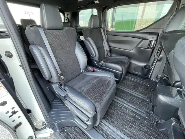 トヨタ アルファード S タイプゴールド 道央・札幌 2020(令2)年 8.3万km ホワイトパールクリスタルシャイン ４WD/純正ディーラーOPナビ/CD/DVD/BT/フルセグ/純正フリップダウンモニター/トヨタセーフティセンス/プリクラッシュセーフティ/横滑り防止装置/レーダークルーズコントロール/レーンキープアシスト/クリアランスソナー/パーキングサポートブレーキ/ロードサインアシスト/バックカメラ/ビルトインETC2.0/ドライブレコーダー/アイドリングストップ/ECOMODE/両側パワースライドドア/パワーバックドア/2列目オットマン/ハーフレザーシート/革巻きウッドコンビステアリング/ステアリングリモコン/AC100V/電動パーキング/ブレーキホールド/MTモード付AT/レーダー探知機/プッシュスタート/スマートキー/LEDヘッドライト/オートライト/オートハイビーム/フォグランプ/電動格納ミラー/ウィンカーミラー/純正フロアマット/ドアバイザー/スペアキー
