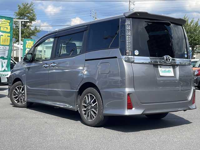 トヨタ ヴォクシー ZS 煌 長野県 2015(平27)年 5.4万km アイスチタニウムマイカメタリック ９インチ純正ナビ/Bluetooth Audio/フルセグテレビ/前方ドライブレコーダー/ＥＴＣ/バックカメラ/両側電動スライドドア/ＬＥＤヘッドライト/純正フロアマット/プッシュスタート/オートライト/ドアバイザー/スマートキー/スペアキー×１/横滑り防止機能/盗難防止機能