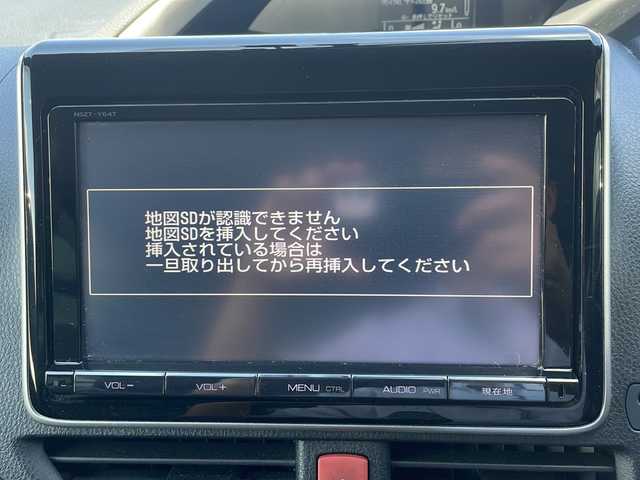 トヨタ ヴォクシー ZS 煌 長野県 2015(平27)年 5.4万km アイスチタニウムマイカメタリック ９インチ純正ナビ/Bluetooth Audio/フルセグテレビ/前方ドライブレコーダー/ＥＴＣ/バックカメラ/両側電動スライドドア/ＬＥＤヘッドライト/純正フロアマット/プッシュスタート/オートライト/ドアバイザー/スマートキー/スペアキー×１/横滑り防止機能/盗難防止機能