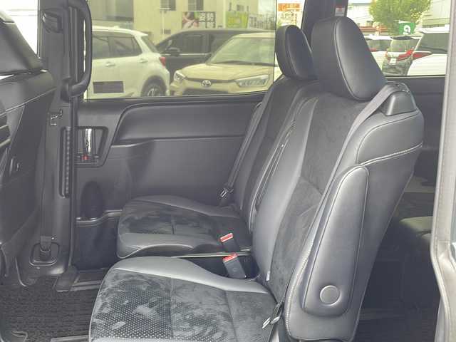 トヨタ ヴォクシー ZS 煌Ⅲ 長野県 2021(令3)年 2.7万km ブラッキッシュアゲハガラスフレーク セーフティーセンス/・プリクラッシュセーフティ/・レーンディパーチャーアラート/・オートマチックハイビーム/・先行車発進告知機能/・インテリジェントクリアランスソナー/純正９インチSDナビ【NSZT-Y68T】/（CD/DVD/フルセグTV/BT）/バックカメラ/ビルトインETC/フリップダウンモニター/両側パワースライドドア/革巻きステアリング/クルーズコントロール/ステアリングスイッチ/アイドリングストップ/MTモード付AT/LEDヘッドライト/フォグランプ/オートライト/ハーフレザーシート/スマートキー/Pスタート/電動格納ミラー/純正１６インチAW/純正フロアマット