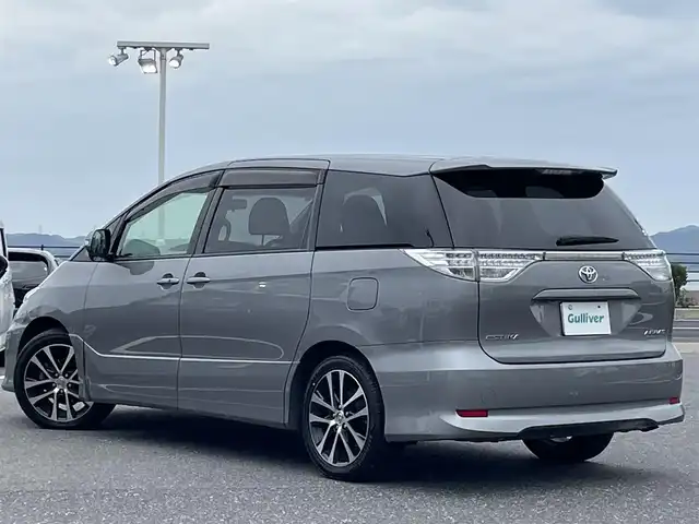 トヨタ エスティマ アエラス 島根県 2015(平27)年 8.9万km アイスチタニウムマイカメタリック 登録時走行距離88478km/ワンオーナー/純正ナビ(Bluetooth・AM・FM・CD・DVD)/フルセグTV/フリップダウンモニター/スマートキー(スペアキー×1)/クルーズコントロール/両側パワースライドドア/バックカメラ/純正フロアマット/純正18インチAW/HID/オートライト/フォグランプ/ウィンカーミラー/ステアリングスイッチ/革巻きステアリング/禁煙車