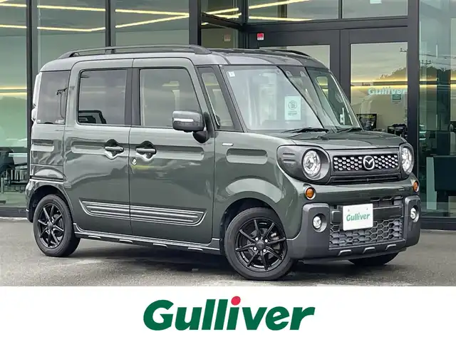 マツダ フレアワゴンタフスタイル ハイブリッドXT 東京都 2021(令3)年 5.9万km 緑 スマート・ブレーキ・サポート/・衝突告知/・衝突被害軽減/・検知対象/ナビ/（ワンセグTV/AM/FM/Bluetooth/SD/DVD/USB）/レーダークルーズコントロール/両側電動スライドドア/シートヒーター/ステアリングスイッチ/革巻きステアリング/スマートキー/プッシュスタート/リアロールサンシェード/車線逸脱警報/横滑り防止装置/取扱説明書