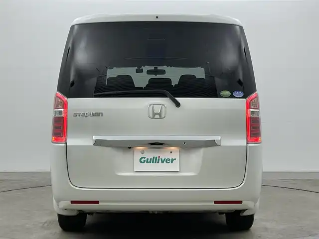 ホンダ ステップワゴン G Eセレクション 岡山県 2013(平25)年 7.3万km ホワイトオーキッドパール フリップダウンモニター/型番:VM-108N/純正９インチナビ/【CD/DVD/フルセグTV】/型番:VXM-135VFNi/バックカメラ/両側パワースライドドア/社外ドライブレコーダー（前後）/ビルトインＥＴＣ/アイドリングストップ/LEORIS15インチアルミホイール/純正フロアマット/フォグランプ/スマートキー×1