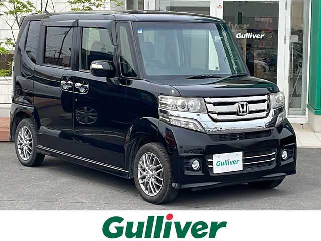 ホンダ Ｎ ＢＯＸ カスタム G Lパッケージ 青森県 2016(平28)年 9万km スマートブラック 4WD/純正８インチナビ・フルセグTV/CD・DVD・Bluetooth/バックカメラ/両側パワースライドドア/前席シートヒーター/純正エンジンスターター/リアシートスライド/シートバックテーブル/後席左右サンシェード/前ドライブレコーダー/HIDライト/LEDフォグランプ/社外14インチAWスタッドレス/社外14インチAW夏タイヤあり/スマートキー/プッシュスタート