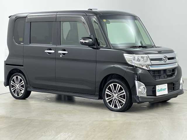 ダイハツ タント カスタム RS SA 道央・札幌 2015(平27)年 6.8万km ブラックマイカメタリック ・禁煙車/・4WD/・純正ナビ&CD&DVD&BT&SD&HDMI&iPod&USB/・純正フリップダウンモニター/・両側パワースライドドア/・バックカメラ/・衝突被害軽減ブレーキ/・横滑り防止装置/・アイドリングストップ/・ETC/・nanoe/・USB入力端子/・純正フロアマット/・電動格納ミラー/・LEDヘッドライト/・オートライト/・スマートキー/・スペアキー/・純正エンジンスターター