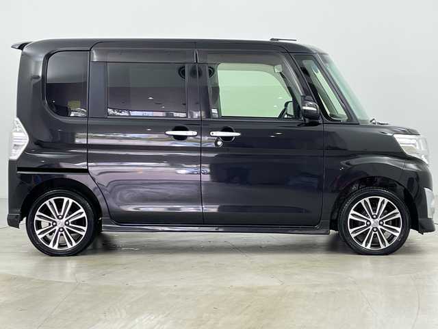 ダイハツ タント カスタム RS SA 道央・札幌 2015(平27)年 6.8万km ブラックマイカメタリック ・禁煙車/・4WD/・純正ナビ&CD&DVD&BT&SD&HDMI&iPod&USB/・純正フリップダウンモニター/・両側パワースライドドア/・バックカメラ/・衝突被害軽減ブレーキ/・横滑り防止装置/・アイドリングストップ/・ETC/・nanoe/・USB入力端子/・純正フロアマット/・電動格納ミラー/・LEDヘッドライト/・オートライト/・スマートキー/・スペアキー/・純正エンジンスターター
