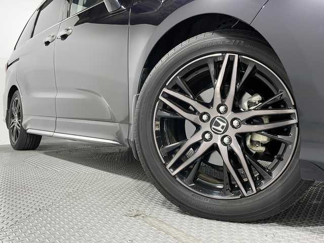 ホンダ オデッセイ ハイブリッド e:HEVアブソルート EX 広島県 2021(令3)年 1.6万km 黒 禁煙車/純正１０型ナビ(VXU-217DYi)/全周囲カメラ/１００Ｖ/シートヒーター/電動リアゲート/両側パワースライドドア/ホールド付電動パーキングブレーキ/パワーシート/レーダークルーズコントロール/オートマチックハイビーム/衝突軽減/レーンキープ/フォグランプ/LEDヘッドライト/コーナーセンサー/エアバッグ(運転席/助手席/サイド/カーテン)/純正18インチアルミホイール(225/50/R18)