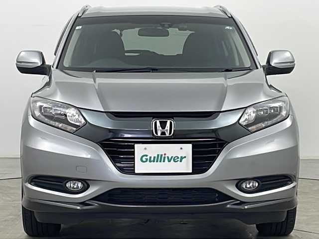 ホンダ ヴェゼル ハイブリッド X Lパッケージ 道央・札幌 2014(平26)年 5万km ティンテッドシルバーM ・4WD/・寒冷地仕様/・純正ナビ&フルエグ&CD&DVD&BT&HDMI&USB/・バックカメラ/・衝突軽減ブレーキ/・クルーズコントロール/・ハーフレザーシート/・シートヒーター/・パドルシフト/・ステアリングスイッチ/・ドアミラーヒーター/・純正ドライブレコーダー/・ビルトインETC/・オートライト/・LEDヘッドライト/・フォグランプ/・スマートキー/・プッシュスタート/・横滑り防止/・純正17インチAW