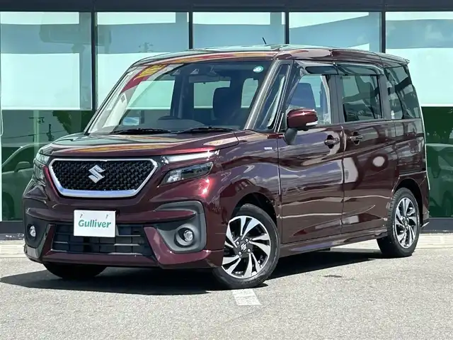 スズキ ソリオ バンディット HV MV 和歌山県 2021(令3)年 2.2万km メロウディープレッドパール メーカーナビ/フルセグTV/全方位カメラ/（AM/FM/CD/DVD/USB/Bluetooth）/衝突軽減ブレーキ/横滑り防止機能/レーンキープアシスト/コーナーセンサー/パワースライドドア/シートヒーター/LEDヘッドライト/オートライト/オートマチックハイビーム/シートヒーター/ヘッドアップディスプレイ/ETC/ドライブレコーダー/純正フロアマット/プッシュスタート/スマートキー