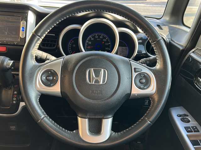 ホンダ Ｎ ＢＯＸ カスタム G ターボ Lパッケージ 静岡県 2015(平27)年 4.5万km カトラリーシルバーM ワンオーナー/純正メモリ何/AM/FM/CD/DVD/BT/ワンセグ/バックカメラ/両側パワースライドドア/プッシュスタート/スマートキー/純正フロアマット/オートライト/キセノンライト/クルーズコントロール/パドルシフト/ハーフレザーシート