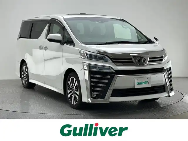 トヨタ ヴェルファイア Z Gエディション 兵庫県 2019(平31)年 5.7万km ホワイトパールクリスタルシャイン ツインムーンルーフ/ALPINE10インチナビ/・AM/FM/CD/DVD/SD/USB/Bluetooth/HDMI/フルセグTV/バックカメラ/パワーバックドア/両側パワースライドドア/前席パワーシート/シートヒーター/シートベンチレーション/運転席メモリー機能付/トヨタセーフティセンス/・プリクラッシュセーフティ/・レーントレーシングアシスト/・オートマチックハイビーム/・レーダークルーズコントロール/クリアランスソナー/ステアリングヒーター/革巻きステアリング/ステアリングスイッチ/前方ドライブレコーダー/ETC