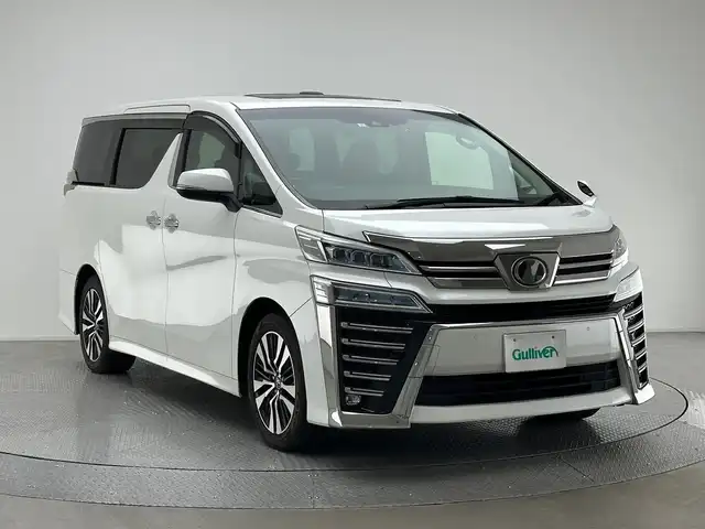 トヨタ ヴェルファイア Z Gエディション 兵庫県 2019(平31)年 5.7万km ホワイトパールクリスタルシャイン ツインムーンルーフ/ALPINE10インチナビ/・AM/FM/CD/DVD/SD/USB/Bluetooth/HDMI/フルセグTV/バックカメラ/パワーバックドア/両側パワースライドドア/前席パワーシート/シートヒーター/シートベンチレーション/運転席メモリー機能付/トヨタセーフティセンス/・プリクラッシュセーフティ/・レーントレーシングアシスト/・オートマチックハイビーム/・レーダークルーズコントロール/クリアランスソナー/ステアリングヒーター/革巻きステアリング/ステアリングスイッチ/前方ドライブレコーダー/ETC