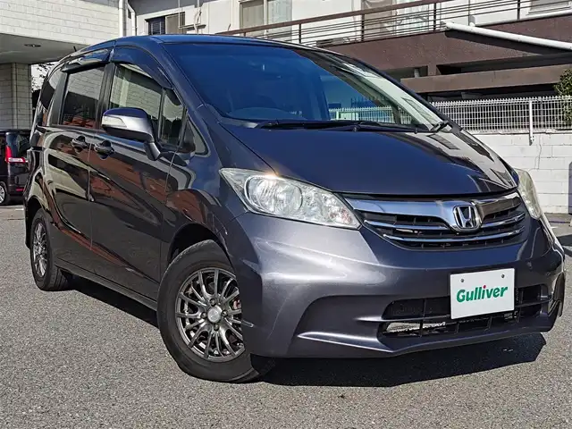 ホンダ フリード G ジャストセレクション+ 大阪府 2014(平26)年 8.7万km モダンスティールM 純正インターナビ・フルセグTV・CD・/　　　DVD・SD・Bluetooth/左後パワースライドドア/ＨＩＤオートヘッドライト/スマートキー2個/バックカメラ/ビルトインＥＴＣ/ステアリングスイッチ/サイドドアバイザー/電動格納ウインカーミラー/社外14インチアルミホイール/フロントガラススーパーＵＶカット/プライムスムース＆スウェード調コンビシート