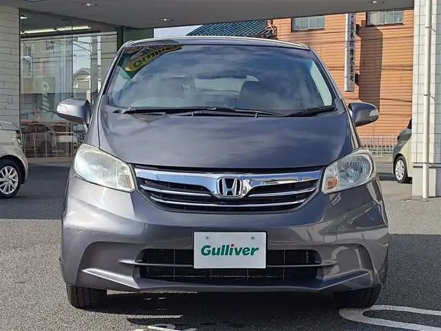 ホンダ フリード G ジャストセレクション+ 大阪府 2014(平26)年 8.7万km モダンスティールM 純正インターナビ・フルセグTV・CD・/　　　DVD・SD・Bluetooth/左後パワースライドドア/ＨＩＤオートヘッドライト/スマートキー2個/バックカメラ/ビルトインＥＴＣ/ステアリングスイッチ/サイドドアバイザー/電動格納ウインカーミラー/社外14インチアルミホイール/フロントガラススーパーＵＶカット/プライムスムース＆スウェード調コンビシート