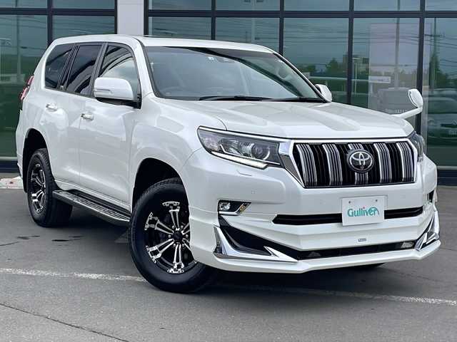トヨタ ランドクルーザー プラド TX 道東・釧路十勝 2022(令4)年 3.6万km ホワイトパールクリスタルシャイン ・４WD/・サンルーフ/・モデリスタフルエアロ（フロント・リア）/・寒冷地仕様/・社外フローティングディスプレイオーディオ/（HDMI・USB・AM・FM・BT・Apple carplay Andoroid)/・スマートキー/・プッシュスタート/・ステアリングスイッチ/・トヨタセーフティ/・オートライト/・プリクラッシュセーフティ/・マフラーカッター/・社外GPSレーダー/・オートクルーズコントロール/・レーンキープアシスト/・オートマチックハイビーム/・保証書