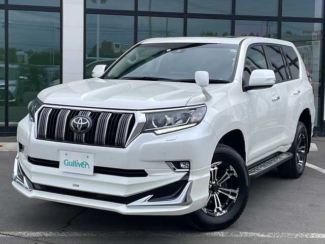 トヨタ ランドクルーザー プラド TX 道東・釧路十勝 2022(令4)年 3.6万km ホワイトパールクリスタルシャイン ・４WD/・サンルーフ/・モデリスタフルエアロ（フロント・リア）/・寒冷地仕様/・社外フローティングディスプレイオーディオ/（HDMI・USB・AM・FM・BT・Apple carplay Andoroid)/・スマートキー/・プッシュスタート/・ステアリングスイッチ/・トヨタセーフティ/・オートライト/・プリクラッシュセーフティ/・マフラーカッター/・社外GPSレーダー/・オートクルーズコントロール/・レーンキープアシスト/・オートマチックハイビーム/・保証書