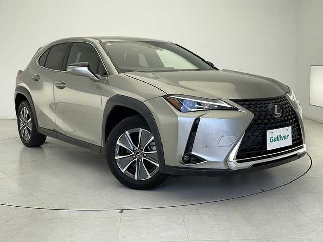 レクサス ＵＸ 300e バージョンC 千葉県 2021(令3)年 1万km ソニックチタニウム 純正ナビ(CD/ DVD/ BT/ USB/ フルセグTV/Miracast）/マークレビンソン/レクサスセーフティ/ブラインドスポットモニター/パノラミックビューモニター/クリアランスソナー/本革シート/パワーシート/シートヒーター/エアシート/後席シートヒーター/パワーバックドア/ドライブレコーダー/ETC２．０/ステアリングヒーター/ヘッドアップディスプレイ/パドルシフト