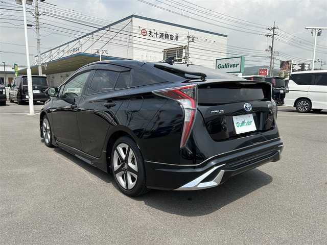 トヨタ プリウス S ツーリングセレクション 岡山県 2016(平28)年 10.5万km アティチュードブラックマイカ 登録時走行距離104762km/純正9インチナビ/フルセグTV(AM.FM.CD.DVD.TV.BT)/モデリスタフルエアロ/バックカメラ/ETC/ドライブレコーダー/シートヒーター/衝突軽減ブレーキ/オートライト/アイドリングストップ/17インチ純正AW/純正フロアマット