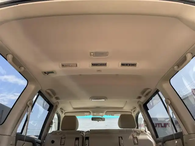 トヨタ ランドクルーザー VX－LTD Gセレクション 群馬県 2004(平16)年 9.6万km ホワイトパールクリスタルシャイン 安全装備/・クルーズコントロール/・オートライト/純正DVDナビ/・AM/FM/CD/MD/バックカメラ/サンルーフ/前席パワーシート/前席シートヒーター/4WD/ETC/ハイトコントロール/フォグランプ/社外エアロ/純正フロアマット/純正ドアバイザー