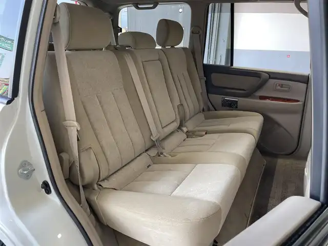 トヨタ ランドクルーザー VX－LTD Gセレクション 群馬県 2004(平16)年 9.6万km ホワイトパールクリスタルシャイン 安全装備/・クルーズコントロール/・オートライト/純正DVDナビ/・AM/FM/CD/MD/バックカメラ/サンルーフ/前席パワーシート/前席シートヒーター/4WD/ETC/ハイトコントロール/フォグランプ/社外エアロ/純正フロアマット/純正ドアバイザー