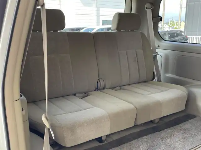 トヨタ ランドクルーザー VX－LTD Gセレクション 群馬県 2004(平16)年 9.6万km ホワイトパールクリスタルシャイン 安全装備/・クルーズコントロール/・オートライト/純正DVDナビ/・AM/FM/CD/MD/バックカメラ/サンルーフ/前席パワーシート/前席シートヒーター/4WD/ETC/ハイトコントロール/フォグランプ/社外エアロ/純正フロアマット/純正ドアバイザー