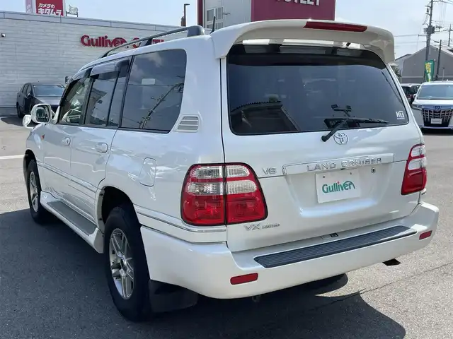 トヨタ ランドクルーザー VX－LTD Gセレクション 群馬県 2004(平16)年 9.6万km ホワイトパールクリスタルシャイン 安全装備/・クルーズコントロール/・オートライト/純正DVDナビ/・AM/FM/CD/MD/バックカメラ/サンルーフ/前席パワーシート/前席シートヒーター/4WD/ETC/ハイトコントロール/フォグランプ/社外エアロ/純正フロアマット/純正ドアバイザー