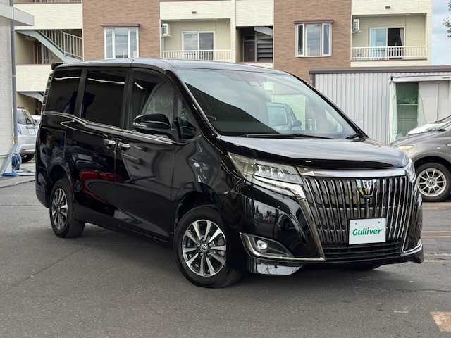 トヨタ エスクァイア Gi プレミアムパッケージ ブラックテーラード 道東・釧路十勝 2020(令2)年 8万km ブラック ４WD/トヨタセーフティセンス/純正OPアルパイン９型ナビ/CD/DVD/BT/USB/HDMI/フルセグTV/バックカメラ/ALPINEフリップダウンモニター/両側パワースライドドア/黒ハーフレザーシート/デアイサー/ウッドコンビステア/ステアリングヒーター/前席シートヒーター/クルーズコントロール/ビルトインETC/純正フォグ/純正マット/ドアミラーウィンカー