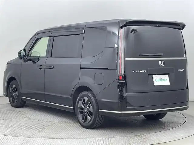 ホンダ ステップワゴン スパーダ 道央・札幌 2023(令5)年 0.4万km クリスタルブラックパール ・ワンオーナー/・寒冷地仕様/・４WD/・DOPギャザーズナビ（LXM-232VFEi）/　CD/DVD/BT/SD/USB/フルセグTV/・ステアリングスイッチ/・バックカメラ/・ビルトインETC/・ホンダセンシング/　CMBS/LKAS/BSM/PKSB/　標識認識/先行車発進告知/・クリアランスソナー/・横滑り防止装置/・アイドリングストップ/・ECON/・ブレーキホールド/・パドルシフト/・パワーバックドア/・両側パワースライドドア/・オートマチックハイビーム/・オートライト/・ヘッドランプレベライザー/・LEDヘッドランプ＆フォグランプ/・ドアミラーウィンカー/・ミラーヒーター/・ハーフレザーシート/・D+N席シートヒーター/・シートバックテーブル/・２列目格納式サンシェード/・純正１６インチAW/・純正フロアマット/・純正ドアバイザー/・プッシュスタート/・スマートキー