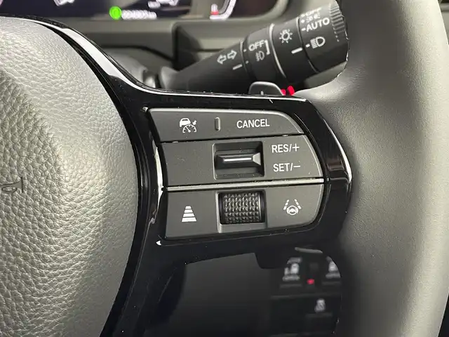 ホンダ ステップワゴン スパーダ 道央・札幌 2023(令5)年 0.4万km クリスタルブラックパール ・ワンオーナー/・寒冷地仕様/・４WD/・DOPギャザーズナビ（LXM-232VFEi）/　CD/DVD/BT/SD/USB/フルセグTV/・ステアリングスイッチ/・バックカメラ/・ビルトインETC/・ホンダセンシング/　CMBS/LKAS/BSM/PKSB/　標識認識/先行車発進告知/・クリアランスソナー/・横滑り防止装置/・アイドリングストップ/・ECON/・ブレーキホールド/・パドルシフト/・パワーバックドア/・両側パワースライドドア/・オートマチックハイビーム/・オートライト/・ヘッドランプレベライザー/・LEDヘッドランプ＆フォグランプ/・ドアミラーウィンカー/・ミラーヒーター/・ハーフレザーシート/・D+N席シートヒーター/・シートバックテーブル/・２列目格納式サンシェード/・純正１６インチAW/・純正フロアマット/・純正ドアバイザー/・プッシュスタート/・スマートキー