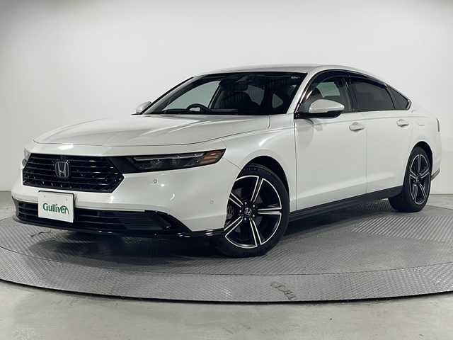ホンダ アコード e:HEV 広島県 2024(令6)年 1.1万km プラチナホワイトパール 12.3型HondaConnectディスプレイ（Googleマップ/フルセグTV/Bluetooth/AppleCarPlay/AndroidAuto）/マルチビューカメラ/BOSEサウンド/黒革シート/パワーシート（運転席/助手席）/ポジションメモリー/シートヒーター（運転席/助手席/後席左右）/ホンダセンシング/・衝突軽減ブレーキ/・誤発進抑制機能/・レーンキープアシスト/・アダプティブクルーズコントロール/・オートハイビーム/・ブラインドスポットモニター/・パーキングセンサー/Hondaパーキングパイロット/LEDヘッドランプ/純正18インチAW/電動パーキングブレーキ/オートブレーキホールド/減速セレクター/ヘッドアップディスプレイ/ETC2.0/ワイヤレス充電/ドライブレコーダー