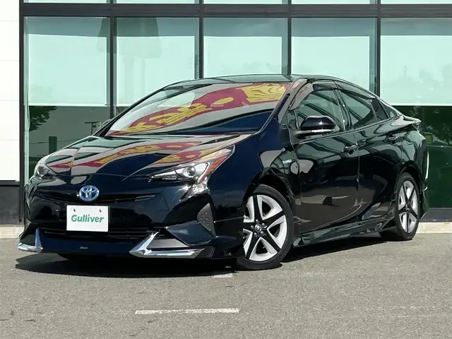 トヨタ プリウス S ツーリングセレクション 和歌山県 2018(平30)年 6.3万km アティチュードブラックマイカ 純正7インチナビ/フルセグTV/Bluetooth/CD/DVD/バックカメラ/ETC/革巻きステアリング/ステアリングスイッチ/レザーシート/前席シートヒーター/LEDヘッドライト/オートライト/モデリスタエアロ/純正17インチAW/ドアバイザー/プッシュスタート/スマートキー
