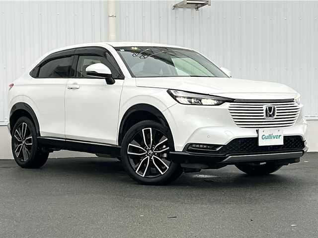 ホンダ ヴェゼル ハイブリッド e:HEV Z 三重県 2022(令4)年 4.7万km プラチナホワイトパール 純正ナビ /バックカメラ /ワイヤレス充電器 /BSM /前後コーナーセンサー /前後ドライブレコーダー/ビルトインETC2.0 /USB給電ポート/ハンドルヒーター /革巻きステアリング/ステアリングスイッチ/ハーフレザーシート/パワーバックドア /レーダークルーズコントロール /レーンキープアシスト/衝突軽減ブレーキ/パドルシフト/純正フロアマット/前席シートヒーター /LEDヘッドライト/オートハイビーム/オートライト/電子パーキング/電動格納ミラー/禁煙車/電動格納ミラー/禁煙車