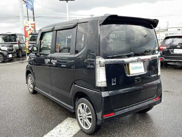 ホンダ Ｎ ＢＯＸ カスタム G Aパッケージ 新潟県 2014(平26)年 10.4万km スマートブラック 4WD/社外ナビ：VXM-145VSi/（BT/DTV/FM/AM/ワンセグ）/バックカメラ/オートライト/アイドリングストップ/ウィンカーミラー/片側パワースライドドア/プッシュスタート/ETC/純正14インチAW/ステアリングスイッチ