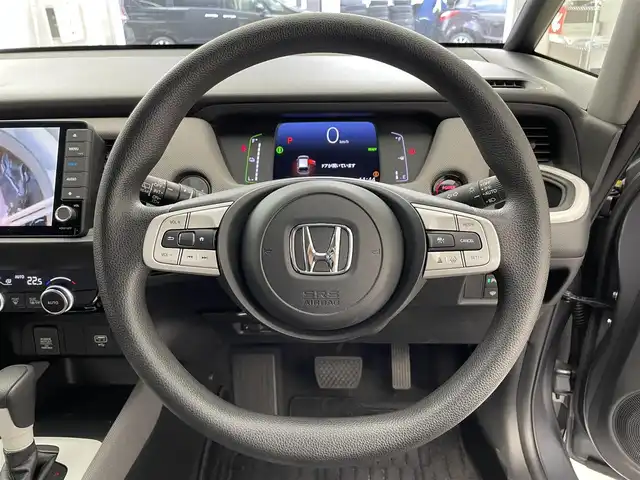 ホンダ フィット e:HEVクロスター 滋賀県 2020(令2)年 3.1万km シャイニンググレーM 純正9インチナビ/【Bluetooth/CD/DVD/フルセグ /USB】/バックカメラ/ホンダセンシング/・衝突軽減ブレーキ〈CMBS〉/・誤発進抑制機能後方誤発進抑制機能/・近距離衝突軽減ブレーキ/・歩行者事故低減ステアリング/・路外逸脱抑制機能/・渋滞追従機能付アダプティブ・クルーズ・コントロール〈ACC〉/・車線維持支援システム〈LKAS〉/・先行車発進お知らせ機能/・標識認識機能/・オートハイビーム/前後ドライブレコーダー/クリアランスソナー/LEDヘッドライト/ETC/電動パーキングブレーキ/ブレーキオートホールド/純正フロアマット/スマートキー