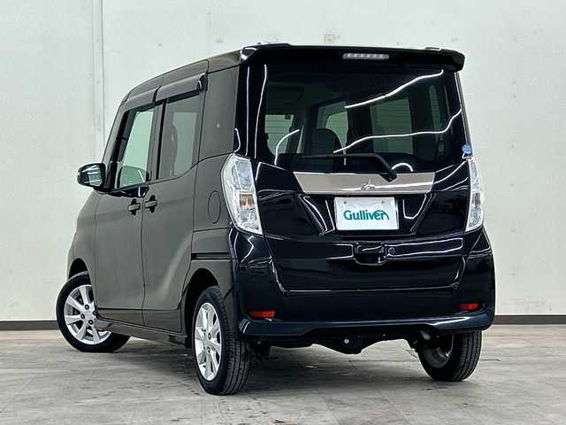 三菱 ｅＫスペース カスタムG 道央・札幌 2014(平26)年 6.8万km アメジストブラック 4WD//社外ナビ//スマートキー//プッシュスタート//片側パワースライドドア//ディスチャージライト