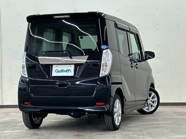 三菱 ｅＫスペース カスタムG 道央・札幌 2014(平26)年 6.8万km アメジストブラック 4WD//社外ナビ//スマートキー//プッシュスタート//片側パワースライドドア//ディスチャージライト