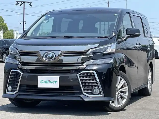 トヨタ ヴェルファイア Z 道央・札幌 2017(平29)年 7.5万km ブラック ４WD/寒冷地仕様/純正ディーラーOPナビ/CD/DVD/BT/フルセグ/純正フリップダウンモニター/プリクラッシュセーフティ/横滑り防止装置/レーダークルーズコントロール/クリアランスソナー/バックカメラ/ビルトインETC/ドライブレコーダー/アイドリングストップ/ワイパーデアイサー/ECOMODE/両側パワースライドドア/2列目オットマン/革巻きステアリング/ステアリングリモコン/電動パーキング/ブレーキホールド/MTモード付AT/プッシュスタート/スマートキー/LEDヘッドライト/オートライト/フォグランプ/電動格納ミラー/ウィンカーミラー/純正フロアマット