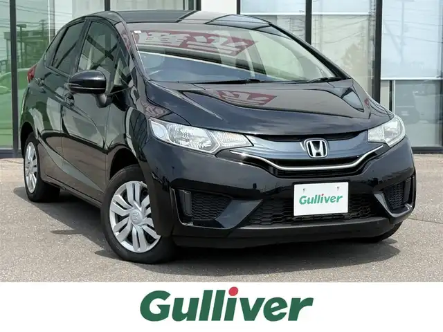 ホンダ フィット 13G Fパッケージ 道南・函館 2013(平25)年 5.6万km クリスタルブラックパール 社外ナビ/フルセグＴＶ/夏冬タイヤ/寒冷地仕様/ＥＴＣ/アイドリングストップ/プッシュスタート/スマートキー/ミラーヒーター/フロアマット/横滑り防止装置/マニュアルレベリング
