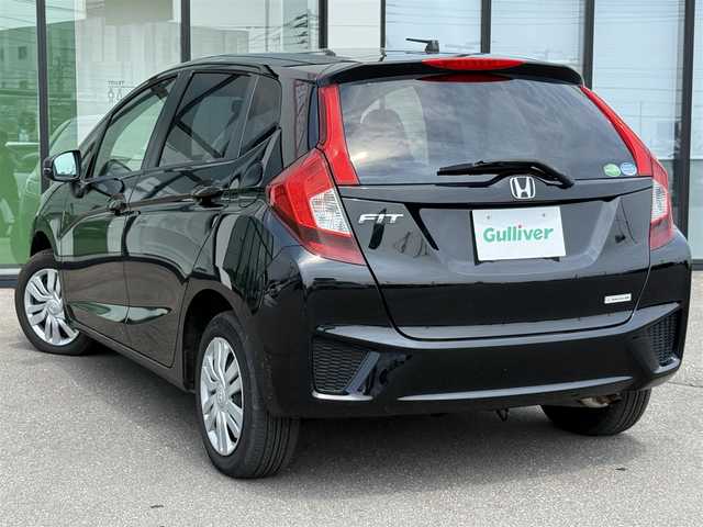 ホンダ フィット 13G Fパッケージ 道南・函館 2013(平25)年 5.6万km クリスタルブラックパール 社外ナビ/フルセグＴＶ/夏冬タイヤ/寒冷地仕様/ＥＴＣ/アイドリングストップ/プッシュスタート/スマートキー/ミラーヒーター/フロアマット/横滑り防止装置/マニュアルレベリング
