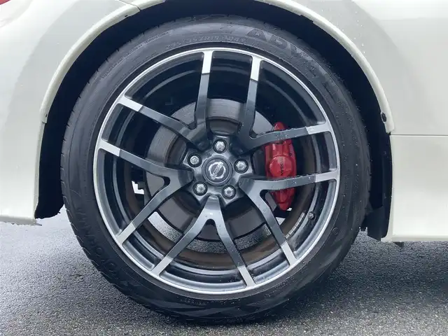 日産 フェアレディ Ｚ ニスモ 静岡県 2016(平28)年 4.5万km ブリリアントホワイトパール 純正メーカーHDDナビ/　AM FM CD DVD Bluetooth AUX/ビルトインETC/バックモニター/前方ドライブレコーダー/３連サブメーター/HIDオートヘッドライト/NISMO専用スポーツマフラー/純正19インチアルミホイール/パドルシフト/スマートキー&プッシュスタート/フルセグTV/BOSEプレミアムサウンドシステム/RECAROハーフレザーシート