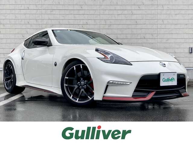 日産 フェアレディ Ｚ ニスモ 静岡県 2016(平28)年 4.5万km ブリリアントホワイトパール 純正メーカーHDDナビ/　AM FM CD DVD Bluetooth AUX/ビルトインETC/バックモニター/前方ドライブレコーダー/３連サブメーター/HIDオートヘッドライト/NISMO専用スポーツマフラー/純正19インチアルミホイール/パドルシフト/スマートキー&プッシュスタート/フルセグTV/BOSEプレミアムサウンドシステム/RECAROハーフレザーシート