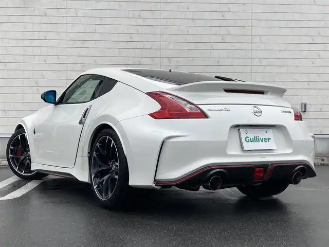 日産 フェアレディ Ｚ ニスモ 静岡県 2016(平28)年 4.5万km ブリリアントホワイトパール 純正メーカーHDDナビ/　AM FM CD DVD Bluetooth AUX/ビルトインETC/バックモニター/前方ドライブレコーダー/３連サブメーター/HIDオートヘッドライト/NISMO専用スポーツマフラー/純正19インチアルミホイール/パドルシフト/スマートキー&プッシュスタート/フルセグTV/BOSEプレミアムサウンドシステム/RECAROハーフレザーシート