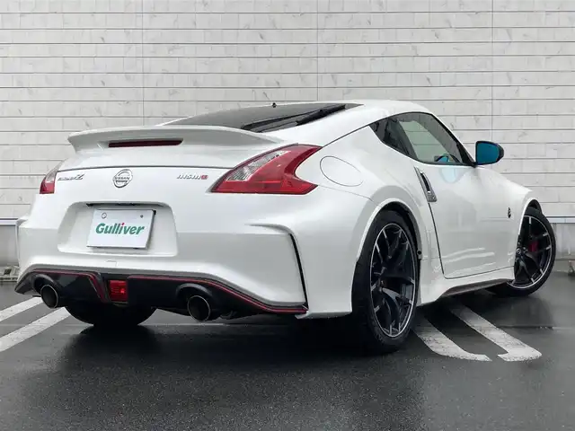日産 フェアレディ Ｚ ニスモ 静岡県 2016(平28)年 4.5万km ブリリアントホワイトパール 純正メーカーHDDナビ/　AM FM CD DVD Bluetooth AUX/ビルトインETC/バックモニター/前方ドライブレコーダー/３連サブメーター/HIDオートヘッドライト/NISMO専用スポーツマフラー/純正19インチアルミホイール/パドルシフト/スマートキー&プッシュスタート/フルセグTV/BOSEプレミアムサウンドシステム/RECAROハーフレザーシート