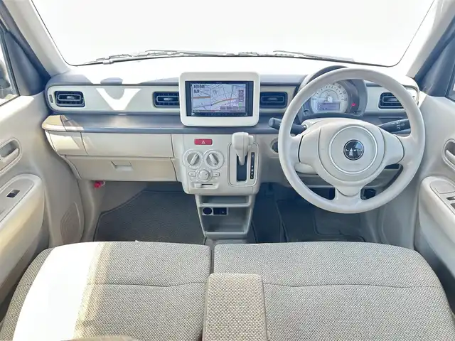 スズキ ラパン G 群馬県 2021(令3)年 0.6万km フォーンベージュM 社外ナビ/　AM/FM/BT/TV/AUX/CD/SD/USB/衝突軽減ブレーキ/レーンキープアシスト/コーナーセンサー/横滑り防止機能/アイドリングストップ/前方ドライブレコーダー/AUTOライト/運転席側シートヒーター/純正フロアマット/純正ドアバイザー/プッシュスタート/保証書/取扱説明書/スペアキー1