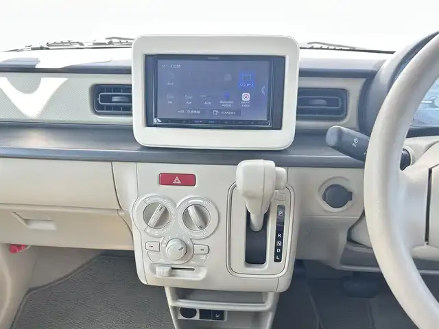 スズキ ラパン G 群馬県 2021(令3)年 0.6万km フォーンベージュM 社外ナビ/　AM/FM/BT/TV/AUX/CD/SD/USB/衝突軽減ブレーキ/レーンキープアシスト/コーナーセンサー/横滑り防止機能/アイドリングストップ/前方ドライブレコーダー/AUTOライト/運転席側シートヒーター/純正フロアマット/純正ドアバイザー/プッシュスタート/保証書/取扱説明書/スペアキー1