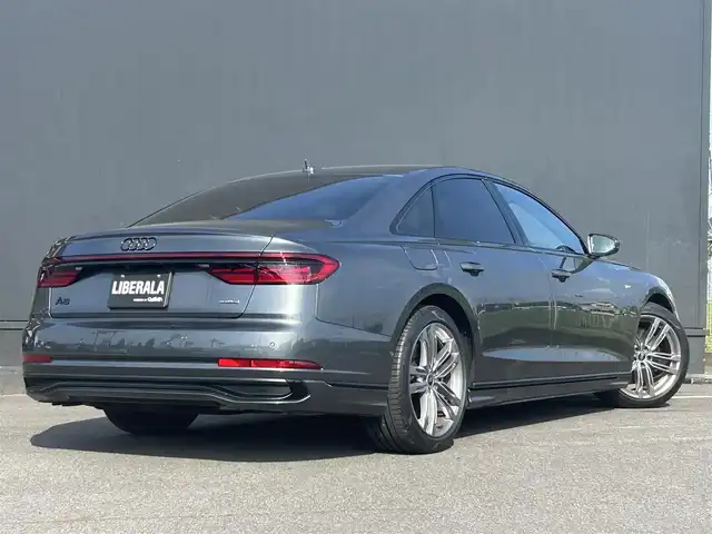 アウディ Ａ８ 55TFSIクワトロ 茨城県 2022(令4)年 0.9万km デイトナグレーパールエフェクト ワンオーナー/ブラックスタイリングパッケージ/コンフォートパッケージ/Slineスタイリングパッケージ/BANG＆OLUFSENサウンド/パノラマSR/MMIナビ/フルセグTV/360°カメラ/ETC/前後ドラレコ/黒革シート/バーチャルコクピット/マトリックスLED/純正20インチAW/パワーシート/シートヒーター/ベンチレーション/パワーバックドア